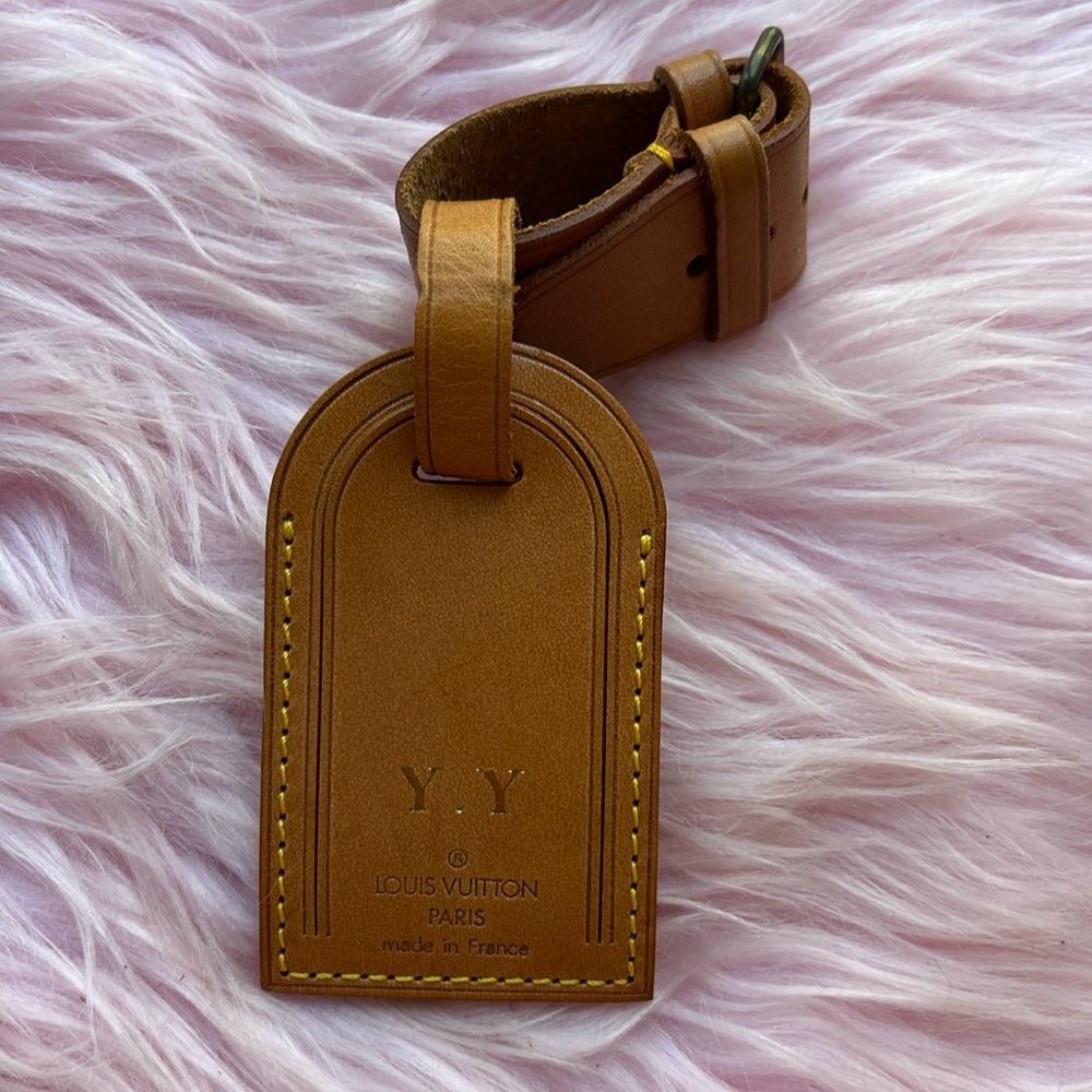 Louis Vuitton luggage tag with Poignet